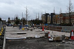 Newly-installed paving and newly-planted trees along Guildhall Road at the site of ongoing renovations at Queen's Gardens in Kingston upon Hull.