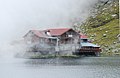 * Nomination Bâlea Cabin in the Făgăraş Mountains, Romania, being covered by a cloud.Andrei Stroe 21:17, 29 September 2010 (UTC) * Promotion -- Ver nice! But first fix the tilt, please. -- Alvesgaspar 21:56, 29 September 2010 (UTC) Rotated slightly CCW. Andrei Stroe 16:38, 30 September 2010 (UTC) Good to me.--Jebulon 22:36, 1 October 2010 (UTC)