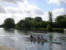 Rowing on the Isis opposite the Oxford college boathouses.