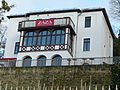 Villa with fencing, terraces (and outbuildings)