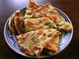 Cong you bing Chinese savory unleavened flatbread folded with oil and minced scallions