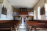 Vue intérieure de la nefvers la tribune d'orgue.