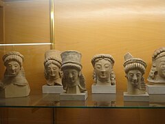Heads of votives
