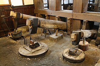 Three of the five tilt hammers Tobiashammer hammer front.jpg