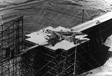 A Boeing B-52 strategic bomber being prepared for EMP testing at Trestle in 1982. US Air Force - Sandia National Laboratory - TRESTLE Electromagnetic Pulse Test Apparatus.jpg