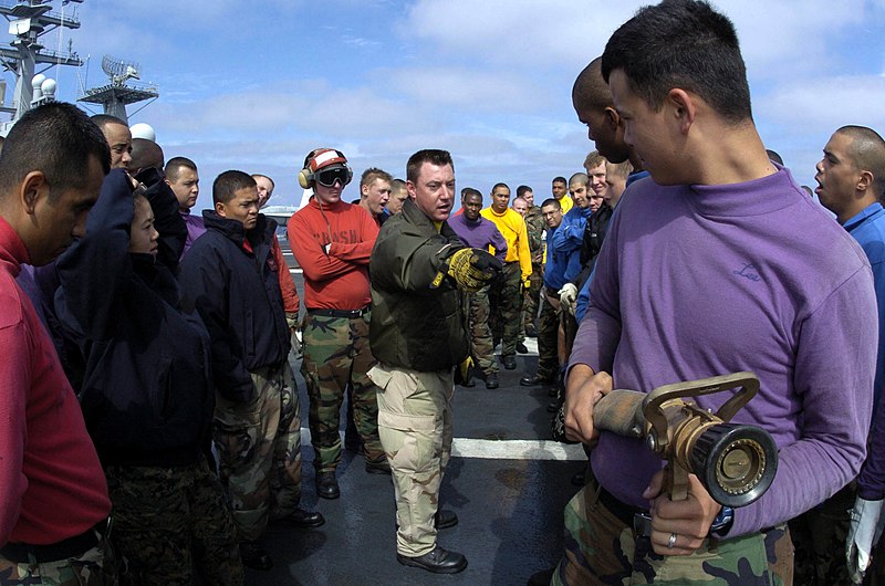File:US Navy 041005-N-8273J-132 Chief Aviation Boatswain's Mate Michael Lauricella of Houston, Texas, conducts aircraft fire fighting training on the flight deck aboard the aircraft carrier USS Nimitz (CVN 68).jpg