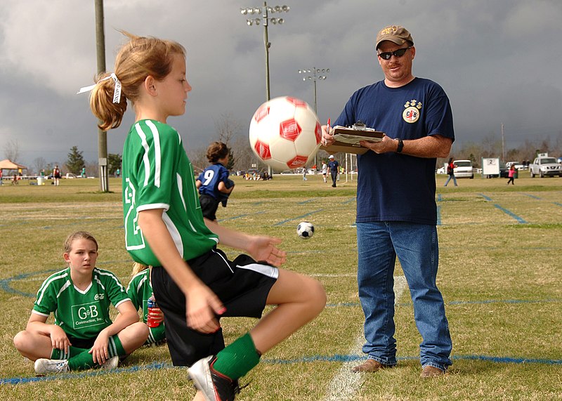 File:US Navy 090228-N-8816D-178 Chief Builder Robert Tyree, right, assigned to Naval Mobile Construction Battalion (NMCB) 133, counts the number of times each participant can juggle a soccer ball without dropping it during a 2009 Gr.jpg