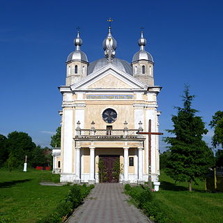 Uhniv Sokalskyi Lvivska-Rizdva Bogorodytsi church-west view.jpg