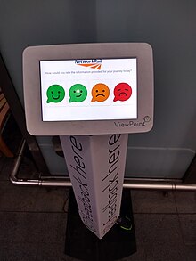 A "Smiley Touch" touchscreen terminal by HappyOrNot HappyOrNot.jpg