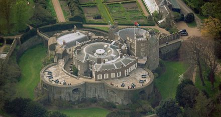 Aerial view of the castle seen from the north-east, showing the later alterations to the upper storeys, with the gatehouse to the upper right