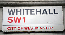 Whitehall is a road in the City of Westminster, London used synecdochically to refer to the entire UK civil service, as many government departments are nearby. Whitehall MOD 45155526.jpg