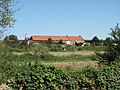 Čeština: Budovy zemědělského družstva ve Žherech. Okres Kolín, Česká republika. English: Buildings of cooperative farming association in Žhery village, Kolín District, Czech Republic.