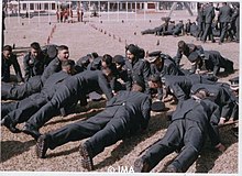 Newly commissioned officers after the passing out parade in 2006 doing celebratory pushups. 2006 Newly Commissioned Officers.jpg