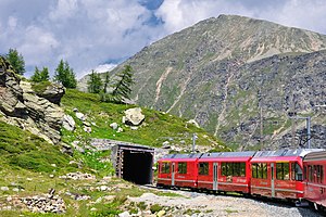 Piz Campasc, in the foreground the Bernina Railway near Alp Grüm
