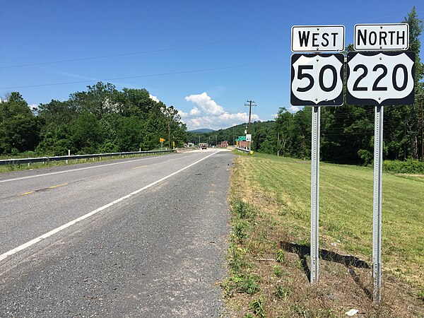 View west along US 50 and north along US 220 (Northwestern Pike) near Paterson Creek in Burlington, Mineral County