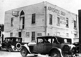 The Apostolic Faith Mission on Azusa Street, Los Angeles, California, now considered to be the birthplace of Pentecostalism AFM on azusa street.jpg