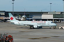 An Embraer E175 in Air Canada Express livery. Operating regional feeder services, Air Canada Express is a subsidiary of Air Canada.