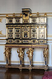 Cabinet with caryatids; c.1675; ebony, kingwood, marquetry of hard stones, gilt bronze, pewter, glass, tinted mirror and horn; unknown dimensions; Musée des Arts décoratifs, Strasbourg, France