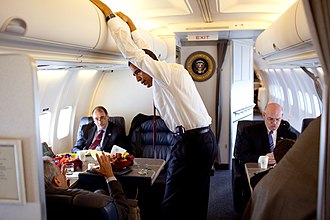 President Obama with his BlackBerry in its holster on a flight to Caen, Normandy, France, June 5, 2009. Barack Obama in Air Force Two.jpg