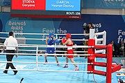 Deutsch: Boxen bei den Olympischen Jugendspielen 2018 Tag 12, 18. Oktober 2018 - Kampf um die Bronzemedaille im Fliegengewicht Mädchen – Heaven Destiny Garcia (USA, blau) schlägt Goryanana Stoeva (Bulgarien, rot) 5-0; Ringrichter ist Ishanguly Meretnyyazov (Turkmenistan). English: Boxing at the 2018 Summer Youth Olympics on 18 October 2018 – Girl's flyweight Bronze Medal Bout - Heaven Destiny Garcia (USA, blue) beats Goryanana Stoeva (Bulgaria, red) 5-0; Referee is Ishanguly Meretnyyazov (Turkmenistan). Español: Boxeo en los Juegos Olímpicos Juveniles de Verano de 2018 en 18 de octubre de 2018 - Combate a medalla de bronce de peso mosca para mujeres: Heaven Destiny Garcia (Estados Unidos, azul) le gana a Goryanana Stoeva (Bulgaria, roja) 5-0; El árbitro es Ishanguly Meretnyyazov (Turkmenistán).