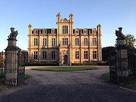 Bylaugh Hall, built 1852. Norfolk, England. Designed by Charles Barry Jr. Bylaugh Hall Summer Evening.JPG