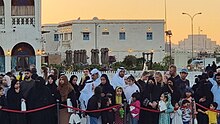 Onlookers gathered to watch to the Ramadan cannon at Souq Waqif Crowd waiting for the Ramadan cannon at Souq Waqif in Doha.jpg