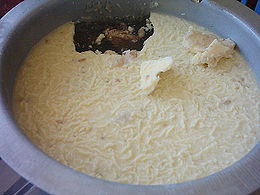 (Frozen soup with a layer of fat shown above) Cooling provides an easy way to degrease food as the fat rises to the surface and solidifies fully. Degreasing soup.jpg