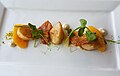 Dinner at the Greenbank Hotel, Falmouth - Pan seared scallops, pistachio praline, cauliflower puree, pink grapefruit, sea salt with crispy chicken skin (42643627772).jpg