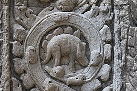 The "dinosaur" relief Dinosaur carving at Ta Prohm temple, Siem Reap, Cambodia (5534467622).jpg