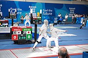 Deutsch: Fechten bei den Olympischen Jugend-Sommerspielen 2018: Tag 1, 7. Oktober 2018, Jungen, Säbel, Viertelfinale - Hibiki Kato (JPN) - Hyun Jun (KOR) 12:15 English: Fencing at the 2018 Summer Youth Olympics at 7 October 2018 – Boys' sabre Quarterfinals – Hibiki Kato (JPN) Vs Hyun Jun (KOR) 12:15