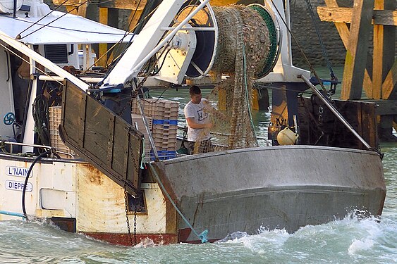 Fishing trawler leaving Le Treport, France