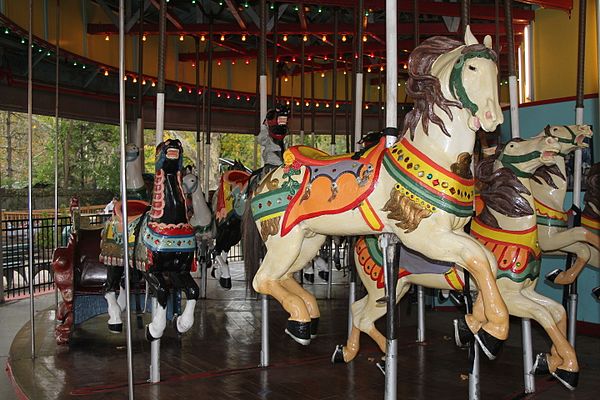 The flamboyant ornamentation was characteristic of the "Coney Island" style of carousel carving.