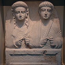 Palmyrene funerary bust of Viria Phoebe and Gaius Virius Alcimus, first century. Funerary bust showing a deceased couple, from Palmyra, Syria, about AD 50-150, British Museum (17812159348).jpg