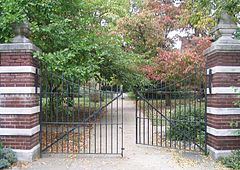 This gate and massive gateposts has no locks—a gate marks a borderline in ownership/use and can allow passage.