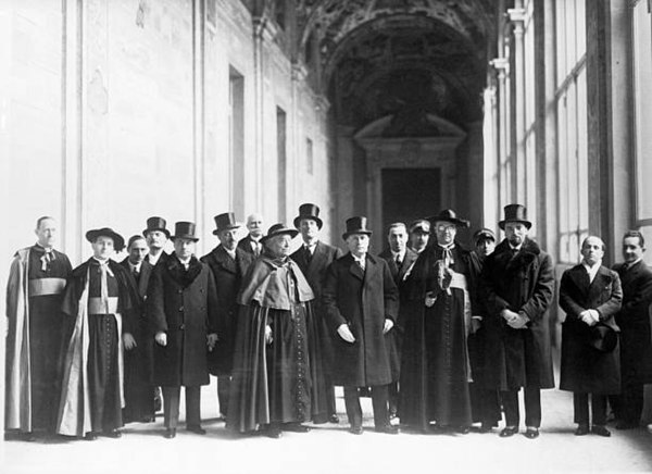 Mussolini and Vatican delegation prior to signing the Lateran Treaty