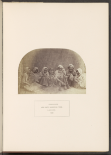 Group of seven crouched Changar people in Lahore, ca.1862-72 Group of seven crouched Changar people in Lahore, ca.1862-72.png