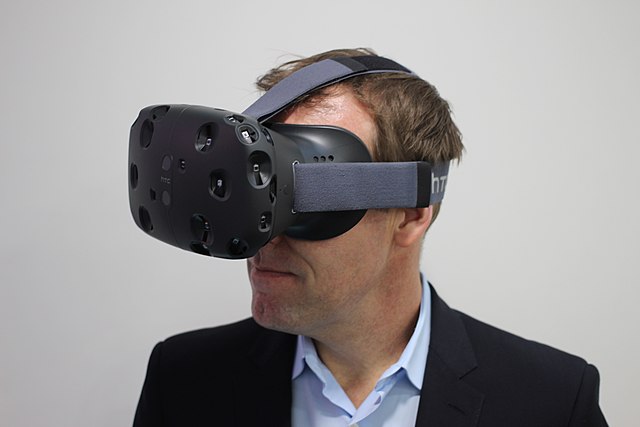 HTC executive director of marketing Jeff Gattis wearing a Vive headset.