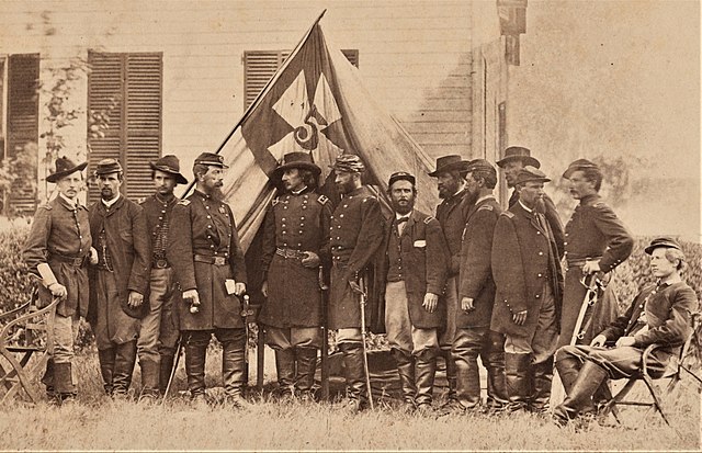 The Civil War headquarters staff of the Army of the Potomac's 5th Corps at the home of Col. Isaac E. Avery near Petersburg, photographed by Matthew Br