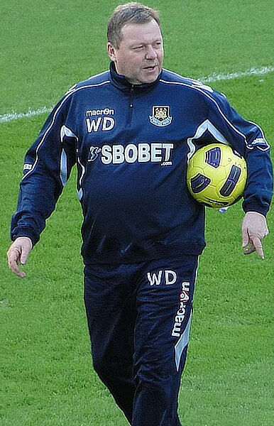 Previously assistant manager, Wally Downes was named as Brentford manager in June 2002.