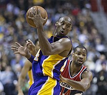 Bryant playing against Gary Neal of the Washington Wizards after announcing his forthcoming retirement, 2015