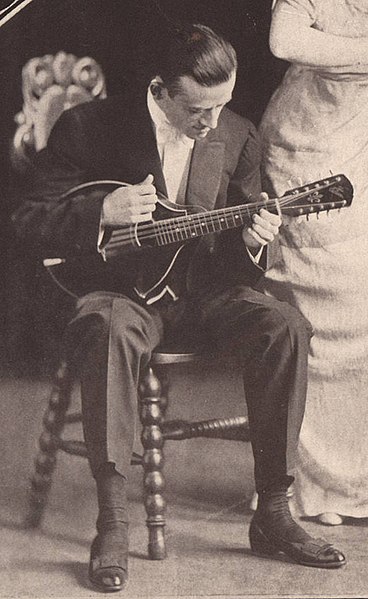 File:Lloyd Loar with custom 10-string Gibson-made mandoviola.jpg