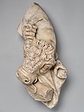 Fragment d'un relief sculpté représentant Hercule et le taureau de Crète.