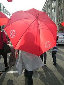 Protest for abortion rights in Brussels, 2012. Manifestante FPS sous un parapluie.jpg