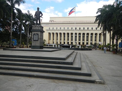 Liwasang Bonifacio and the Manila Central Post Office. The center of the plaza is dominated by a bronze statue of Andrés Bonifacio