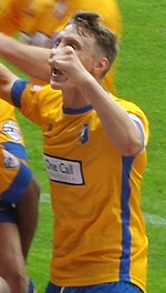 Riley playing for Mansfield Town in August 2013. Martin Riley 1.jpg