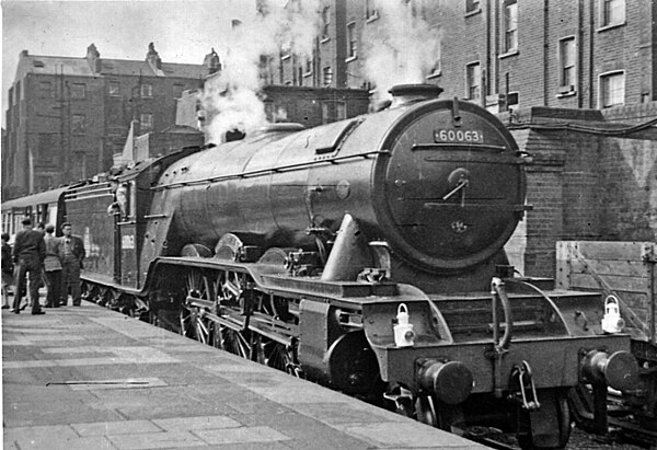 10am London to Manchester express hauled by LNER A3 Pacific No.60063 'Isinglass' at Marylebone in May 1956