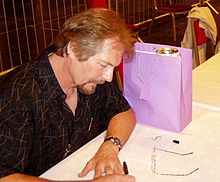 Майкл Уилан Глазгода өткен 63-ші Дүниежүзілік ғылыми-фантастикалық конвенцияда, 2005 жылғы тамыз