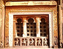 Chaumukhnath trellis, possibly from the 5th century, with dancing and music-making Ganas and the river goddesses Ganga and Yamuna Nachna, Chaumukhnath-Tempel Jali-Fenster (1999).jpg