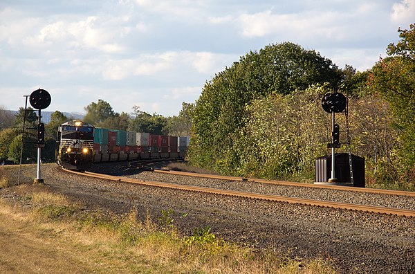 Eastbound intermodal train on the Pittsburgh Line in Newport