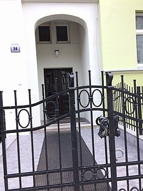 Entry portal and wrought iron fence